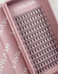 Full tray of LAVILASH 10D Promade Lashes showing deep black fans and narrow bases ideal for professional lash artists